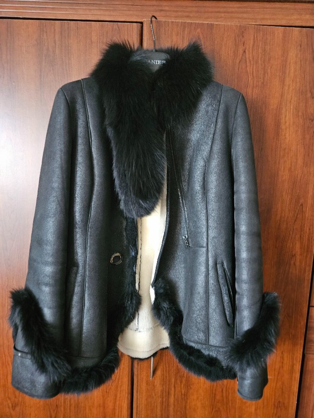 Black shearling coat with fur trim